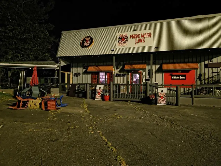 The R & B Made With Love storefront lit up at night on Burnt Mountain Rd, Jasper, GA